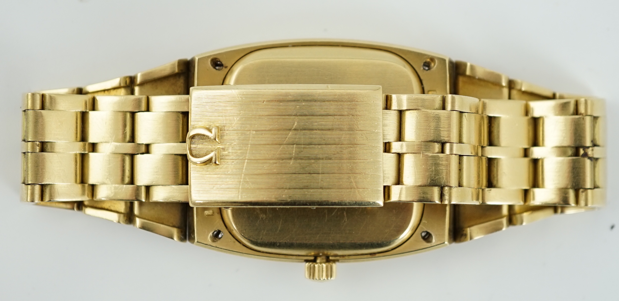 A gentleman's 1970's 18ct gold Omega Constellation automatic wrist watch, on an 18ct gold Omega bracelet